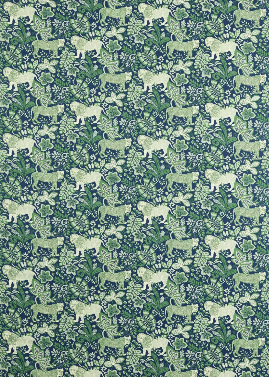 Rumble in the Jungle Fabric - Midnight / Mint Leaf by green animal printed fabric from Scion