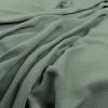 green plain woven fabric from Warwick