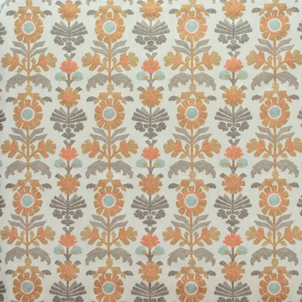 Oslo Fabric - Zest by orange botanical embroideried fabric from Fibre Naturelle