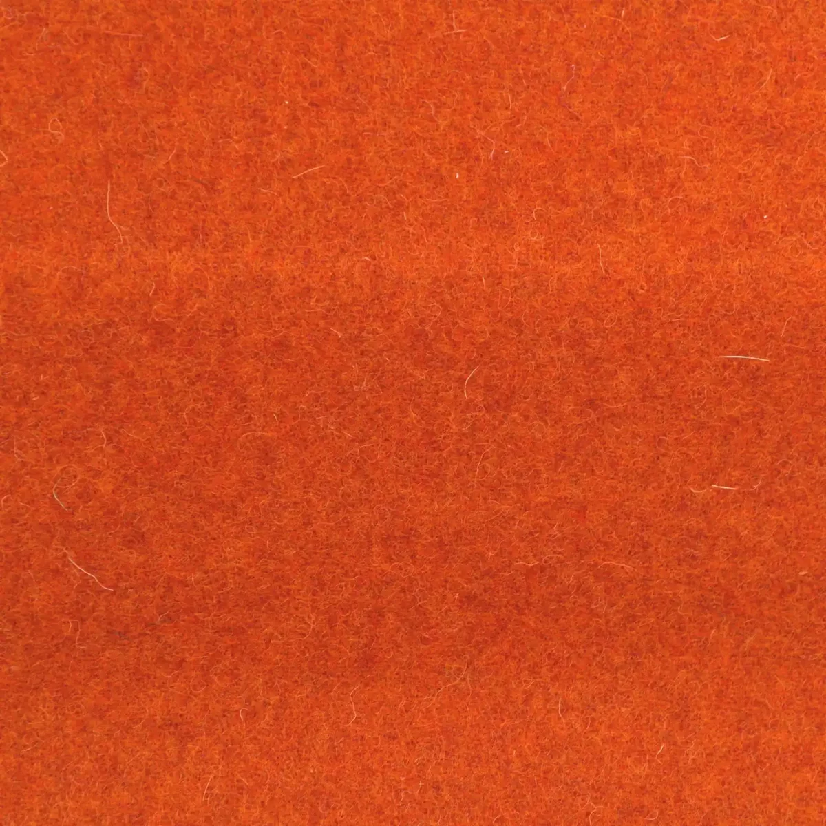 Earth Fabric - Fire by orange plain woolen fabric from Abraham Moon & Sons
