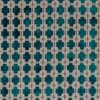 green geometric velvet-chenille fabric from Clarke & Clarke