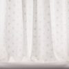 white spotted embroideried fabric from Colefax & Fowler