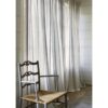 white plain linen curtain from Colefax & Fowler and chair