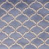 blue geometric embroideried fabric from Clarke & Clarke