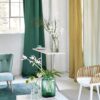 plain silk-satin curtain from Designers Guild and side table and chairs