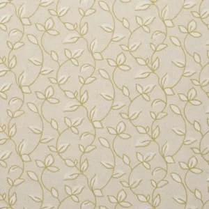yellow botanical embroideried fabric from Clarke & Clarke