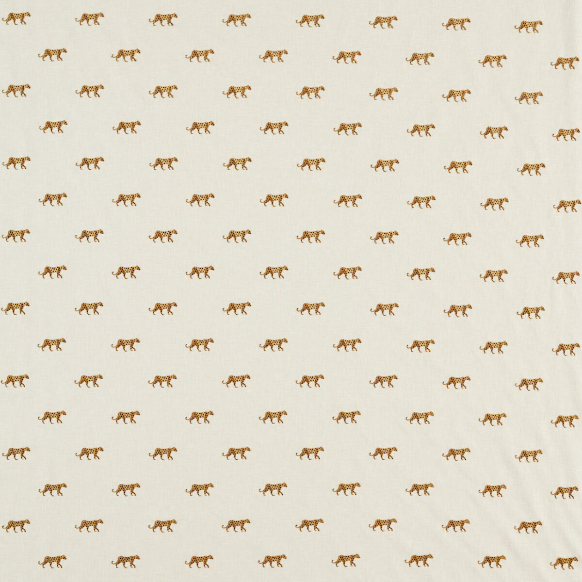 white animal embroideried fabric from Clarke & Clarke