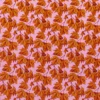 orange botanical velvet-chenille fabric from Harlequin