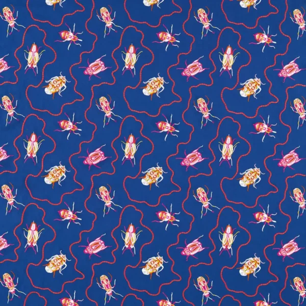 blue animal embroideried fabric from Harlequin