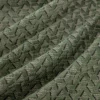 green geometric woven fabric from Warwick