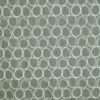 green spotted embroideried fabric from Prestigious Textiles