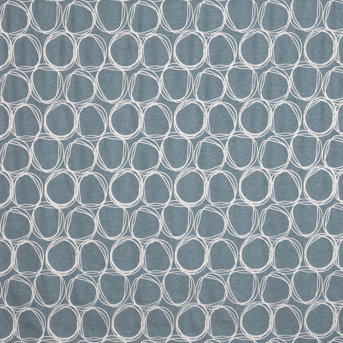 Iver Fabric - Denim by blue spotted embroideried fabric from Prestigious Textiles