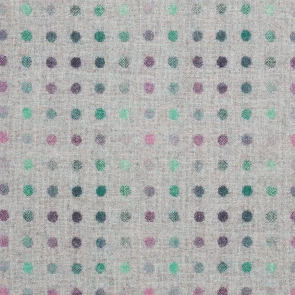 green spotted woolen fabric from Abraham Moon & Sons