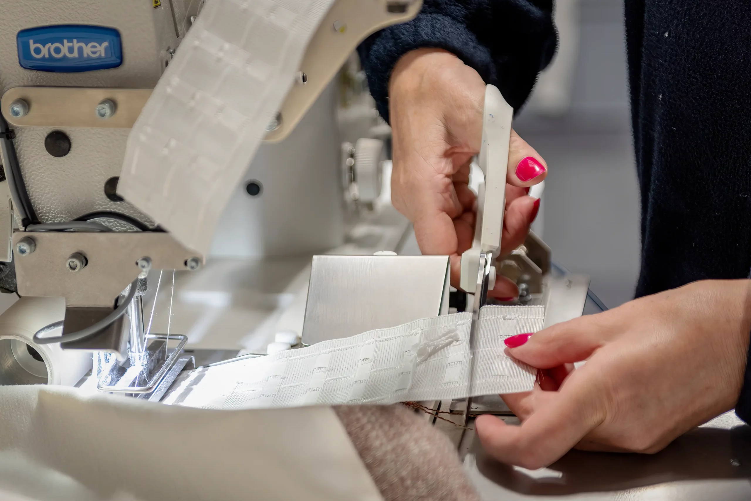 cutting curtain heading tape with scissors