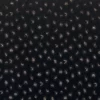 black-grey spotted embroideried fabric from Casamance
