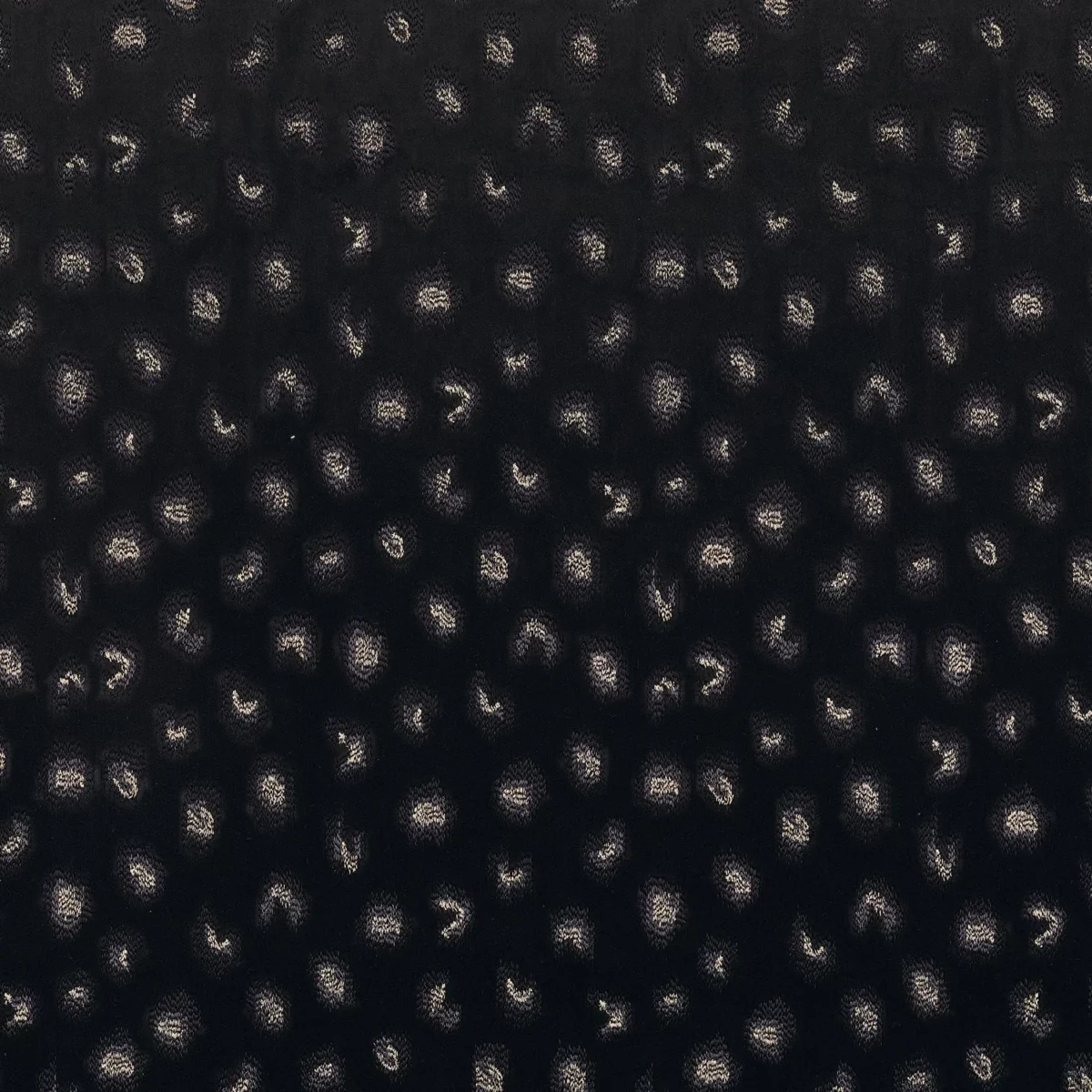 Daim Fabric - Noir by black-grey spotted embroideried fabric from Casamance