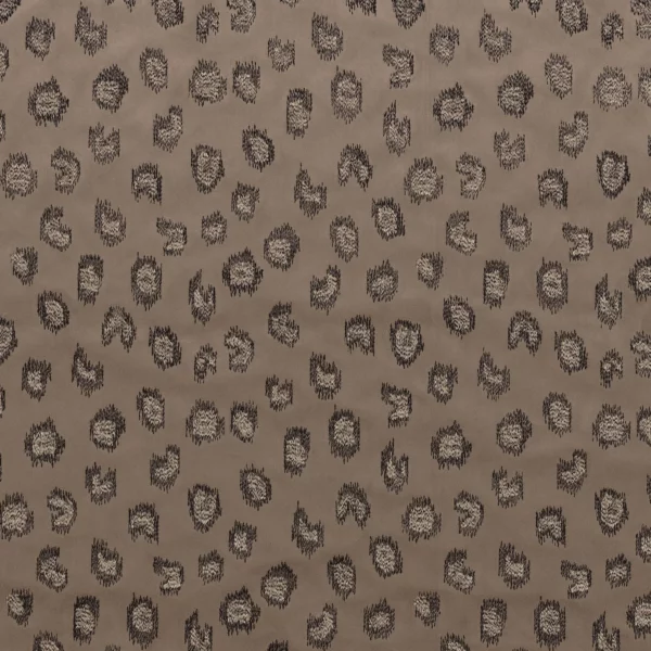 Daim Fabric - Taupe by brown spotted embroideried fabric from Casamance