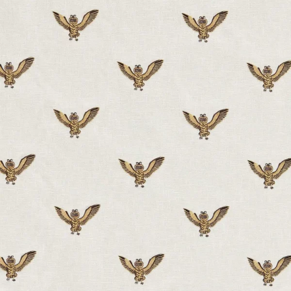 yellow animal embroideried fabric from Emma Shipley