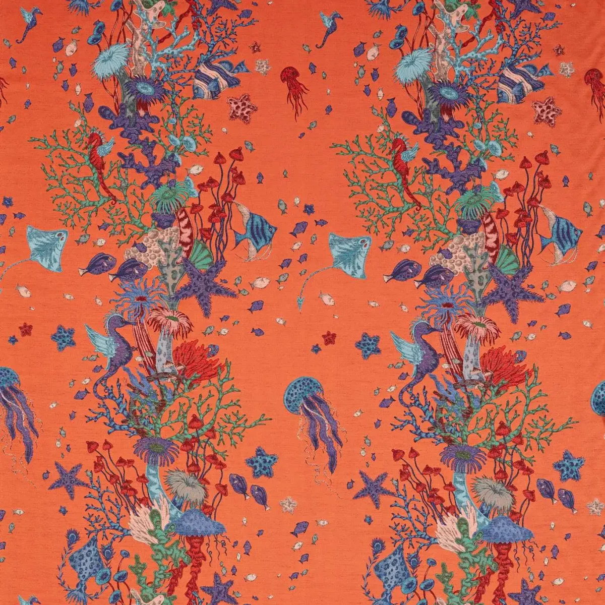 orange animal embroideried fabric from Emma Shipley