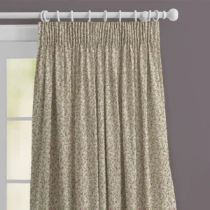 top half of curtain neutral cloth with green leaves and purple flowers on a white wooden pole