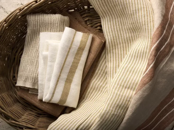 Thora Fabric - Flint by white textured fabric with basket