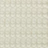 green geometric embroideried fabric from Harlequin