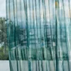 blue contemporary voile-sheer fabric from Harlequin