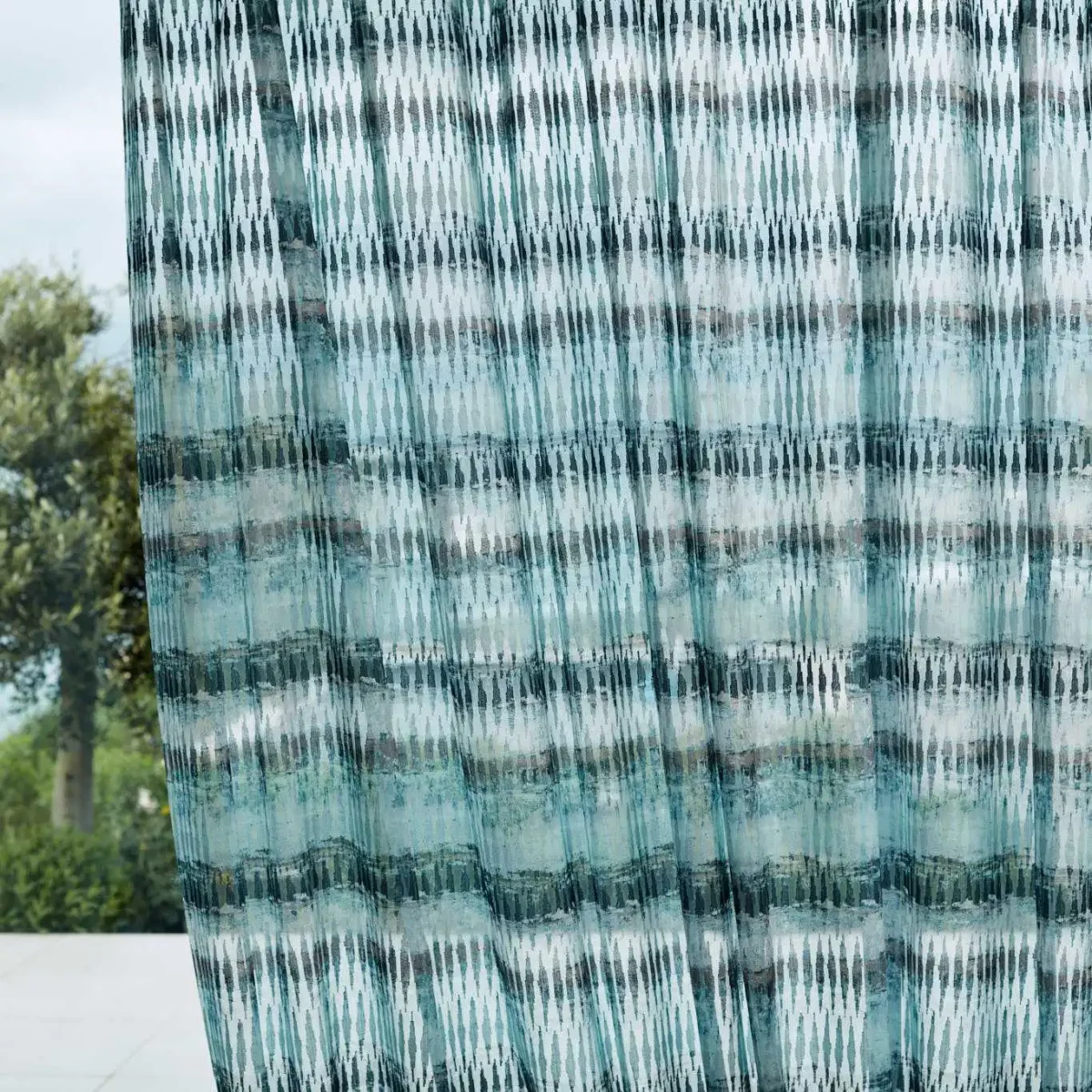 blue striped voile-sheer fabric from Harlequin