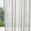 neutral striped voile-sheer fabric from Harlequin