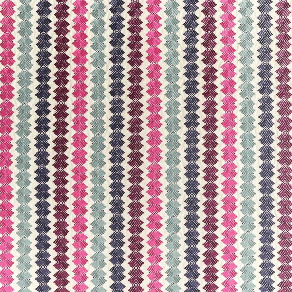 multicolour geometric embroideried fabric from Harlequin