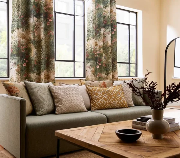 Habitat Fabric - Agate by blue botanical cushion with sofa and curtain