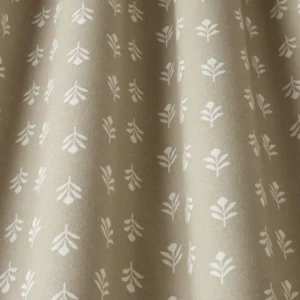 neutral botanical fabric with weave