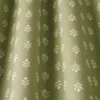 green botanical fabric with weave