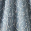 blue botanical fabric with weave