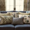 blue striped cushion with sofa and curtain