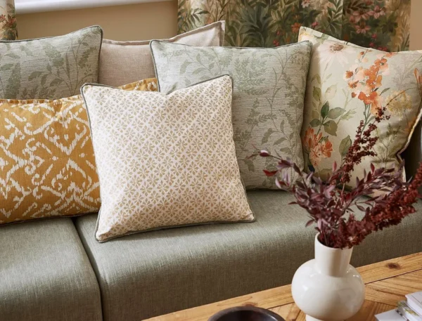 green misc cushion with sofa