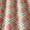 red checked cushion with pouf and curtain