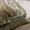 green botanical cushion with rug