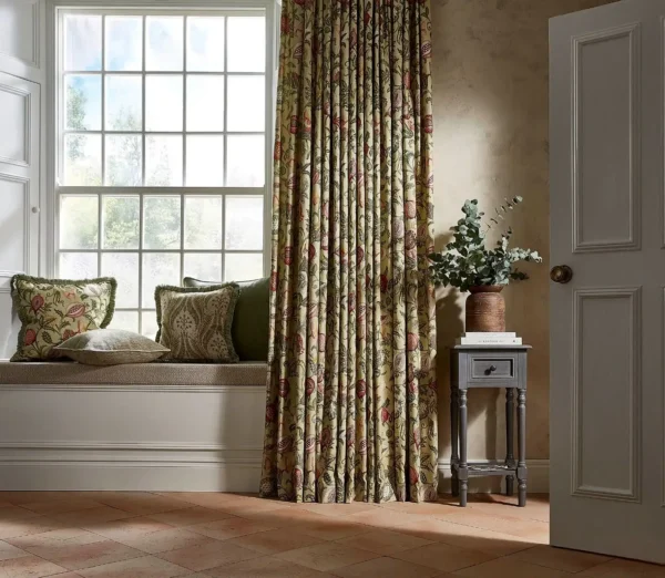 Severino Fabric - Sage by green botanical cushion with curtain and window