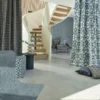 Various curtains in open plan room