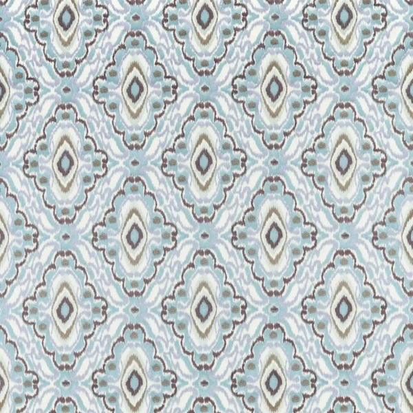 blue traditional embroideried fabric from Harlequin