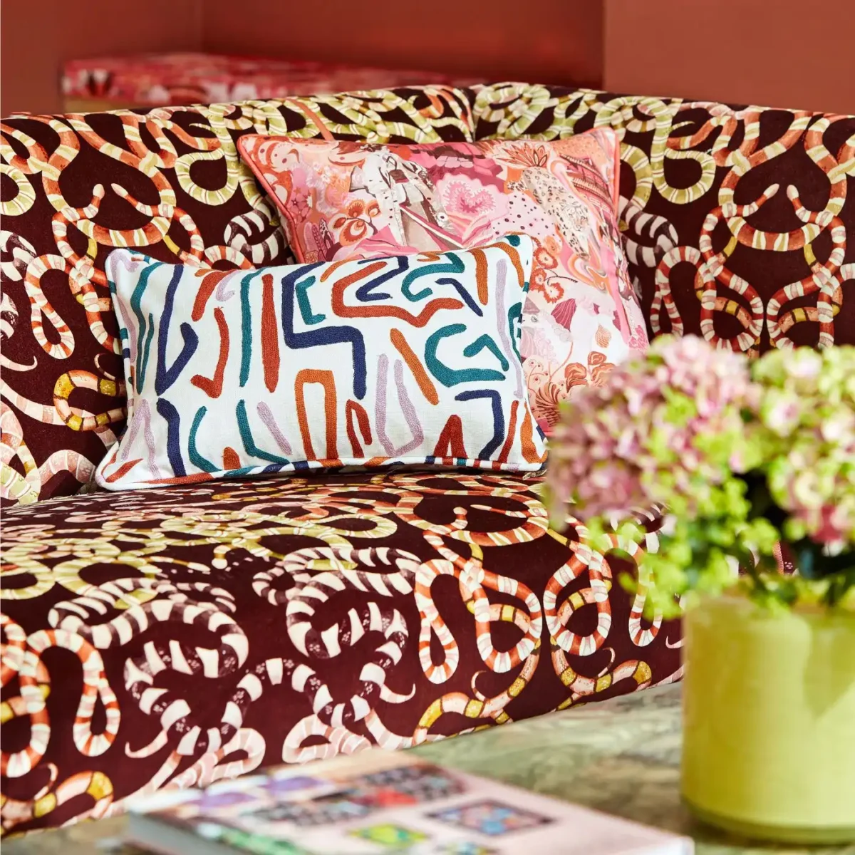 multi colour swiggle cushion on snake cofa