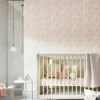 pink rabbit and wild flowers wallpaper with crib