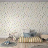multi coloured dot wallpaper in playroom