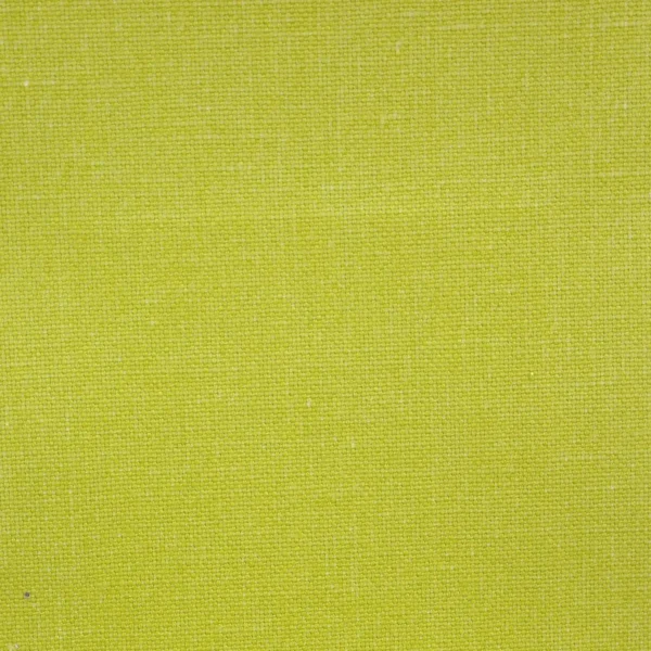 Manzoni Fabric - Pistachio by green plain linen fabric from Designers Guild