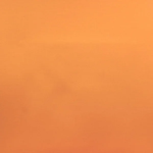orange plain cotton fabric from Designers Guild
