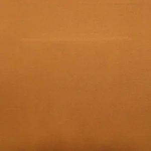 orange plain cotton fabric from Designers Guild
