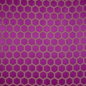 pink geometric embroideried fabric from Designers Guild