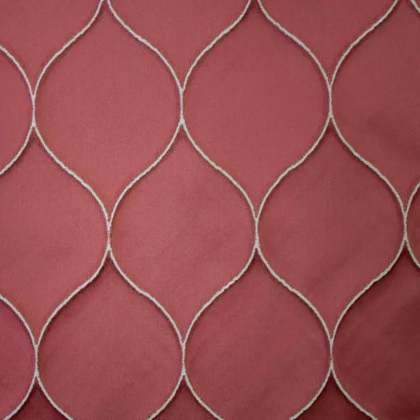 red geometric jacquard fabric from Ashley Wilde