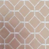 brown geometric jacquard fabric from Ashley Wilde